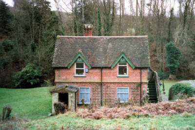 Many Waters in the 1990's before demolition - note the large boulder on the right